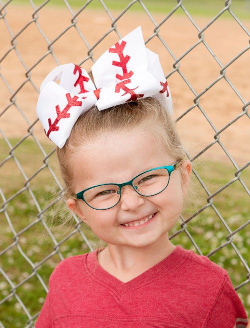Baseball Texas size  hair bow for girls shown on model
