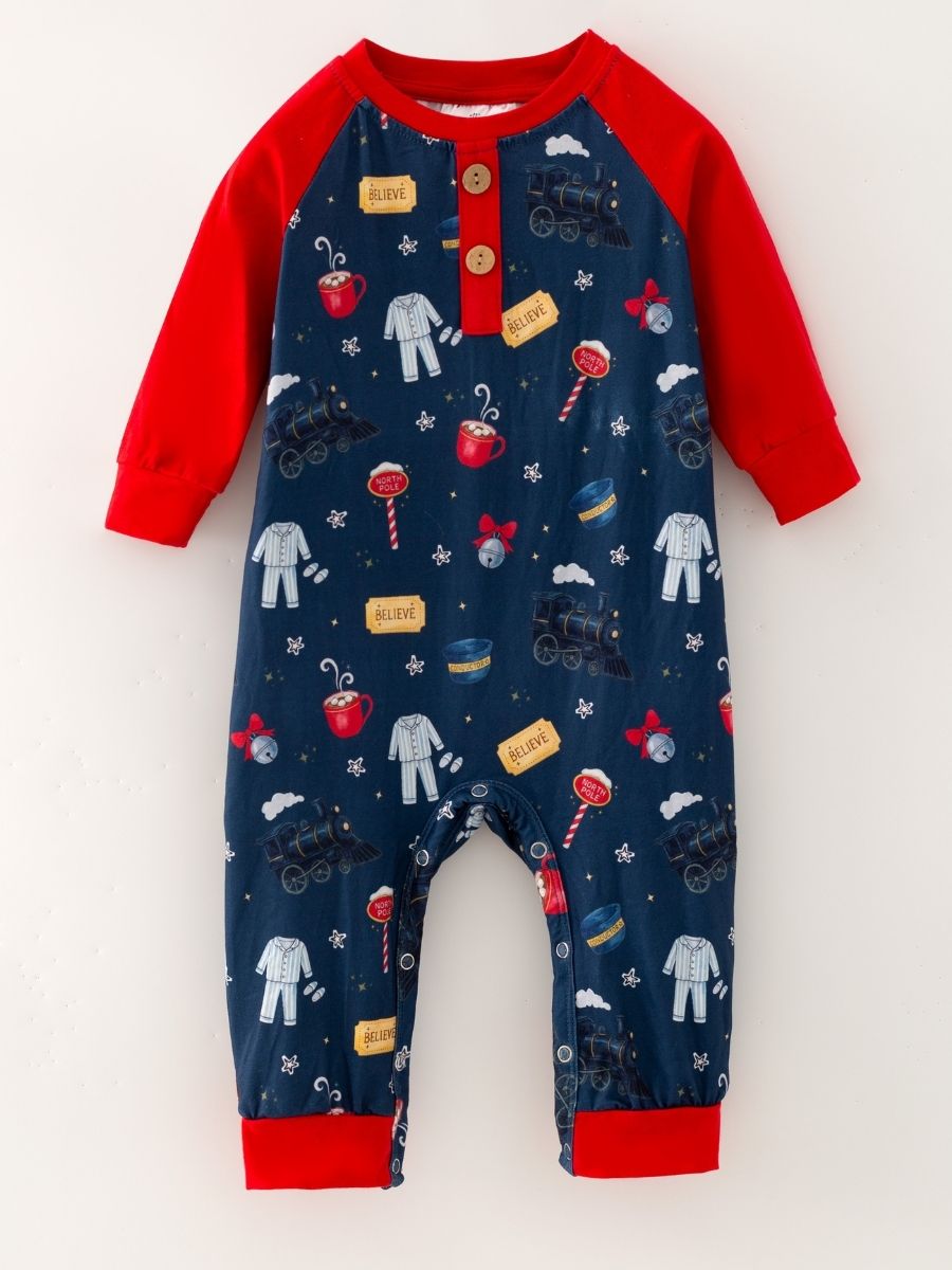 Boys Christmas train print infant romper with red raglan sleeves, wooden buttons, and snap closure.