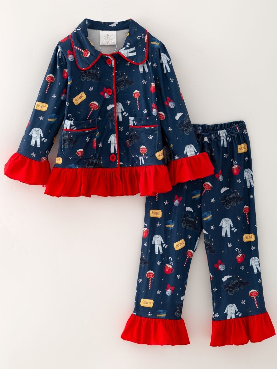 Girls navy Christmas train pajama set with red ruffle trim, button-front top and matching pants featuring holiday train print.