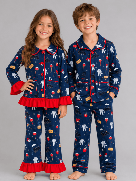 navy Christmas train pajama set with red ruffle trim, button-front top and matching pants featuring holiday train print.