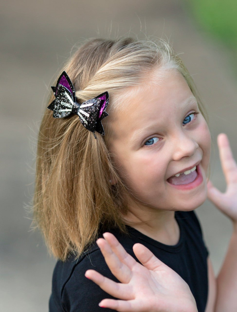 Black and hot pink glitter cat bow clippie with silver whiskers