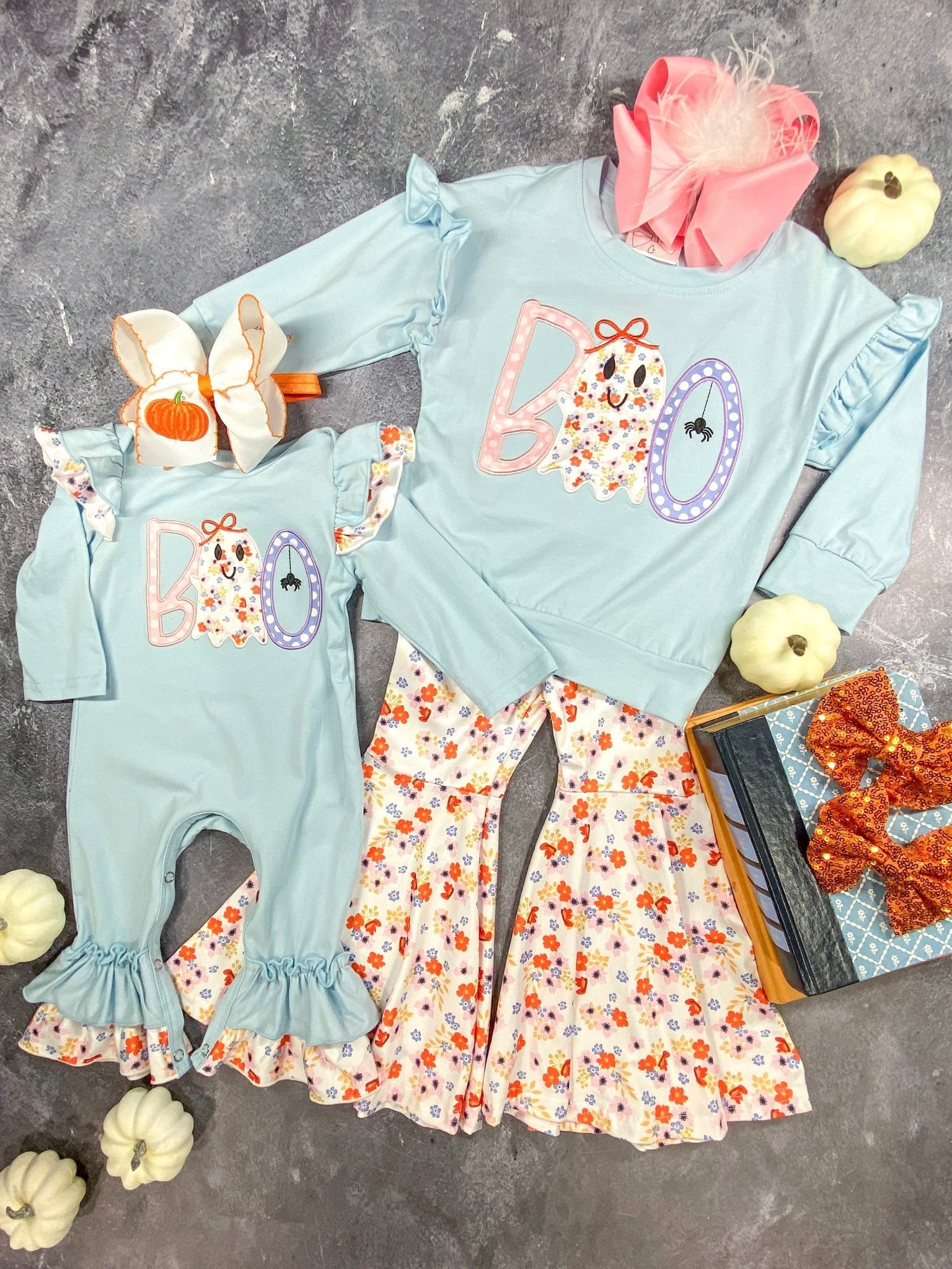 Blue BOO Long Sleeve & Floral Bell Bottoms Set next to matching infant romper