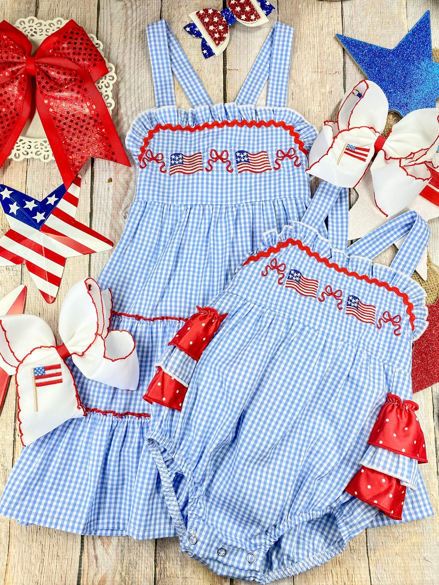  Smocked Flag Gingham Tiered Dress and romper on a wooden background