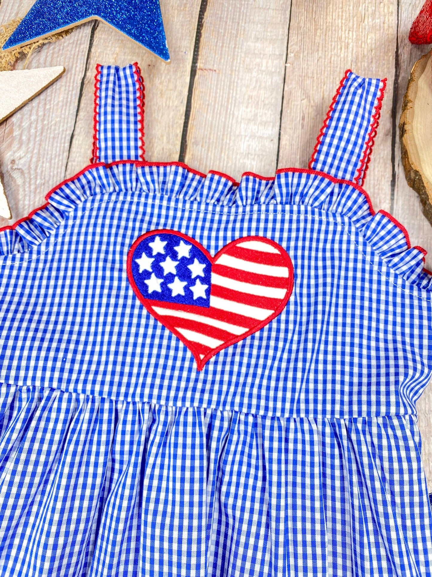 Heart Gingham Dress on a wooden background