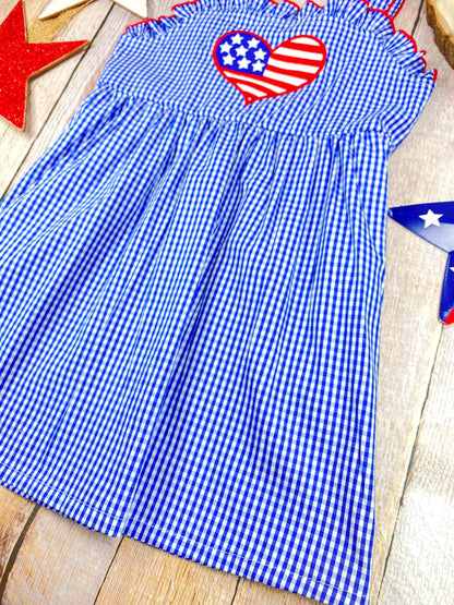 Heart Gingham Dress on a wooden background