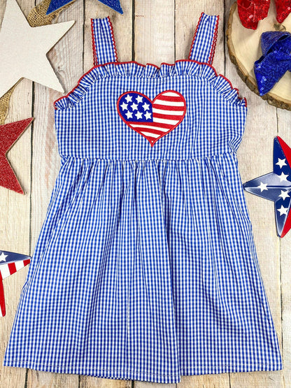 Heart Gingham Dress on a wooden background