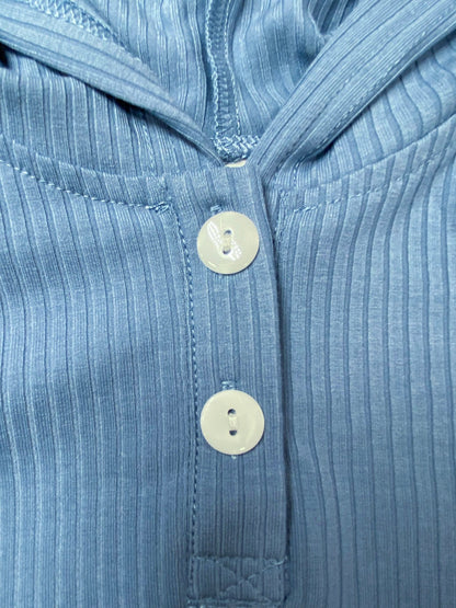 Close-up of the buttons at the top of the hoodie