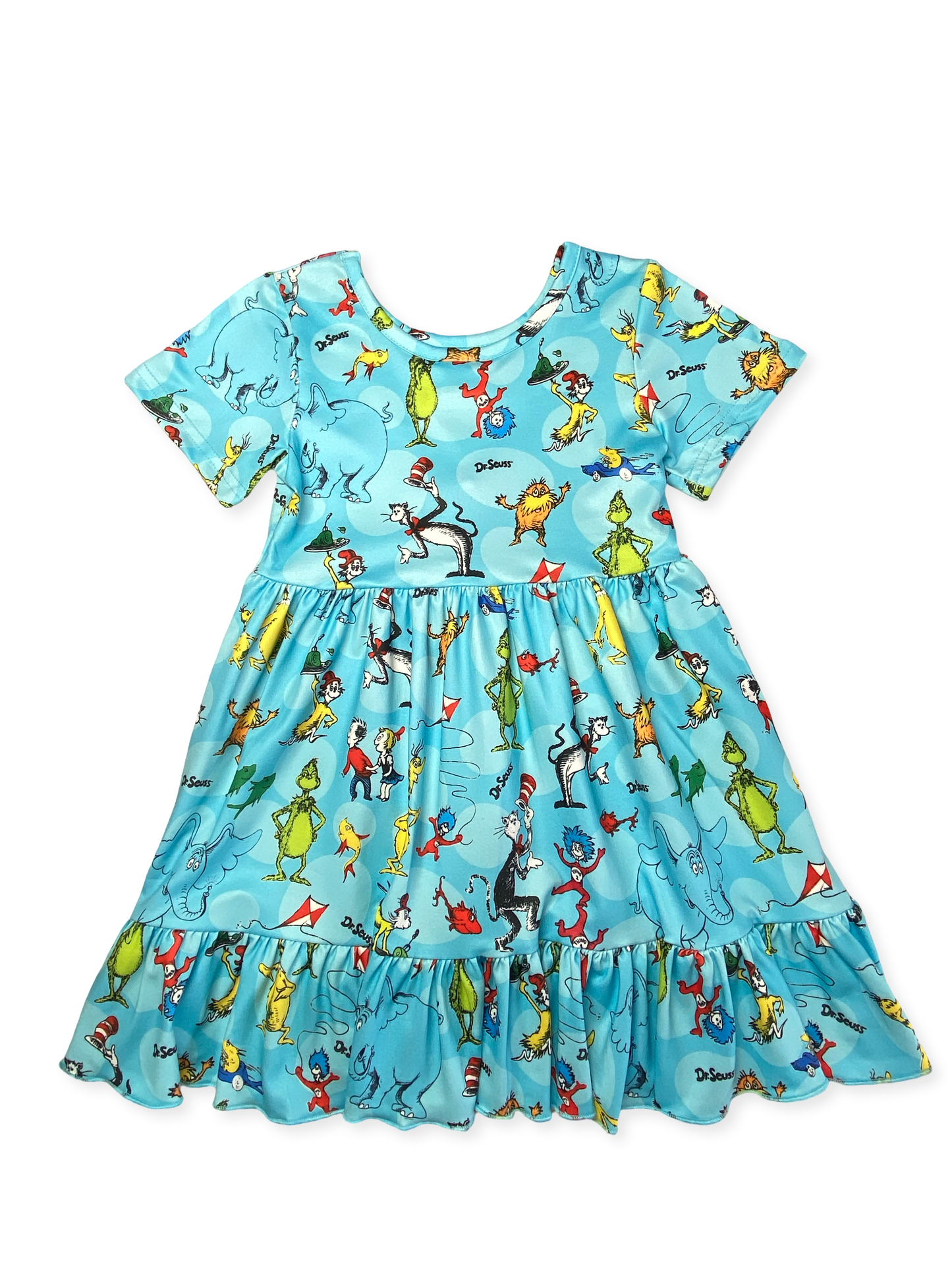 Children's dress with colorful character print on a white background