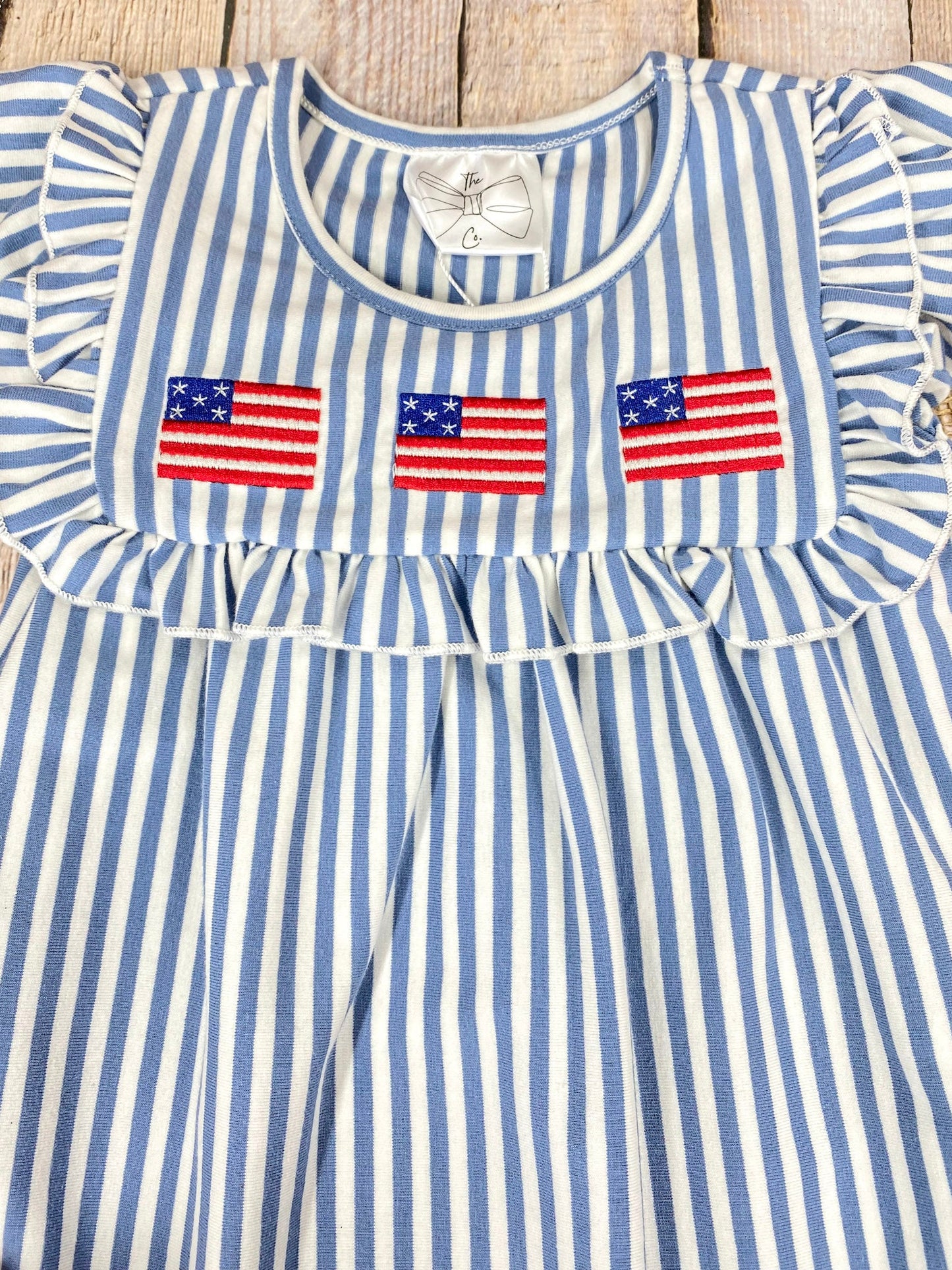 Classic Flag Stripe Dress on a wooden background