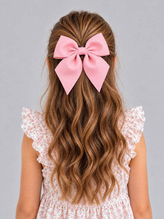 Girl wearing a pink short tail grosgrain hair bow in a half-up hairstyle - Alternative view