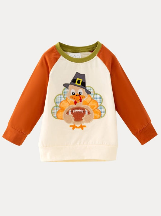 Boys Thanksgiving raglan shirt with turkey football appliqué and orange sleeves