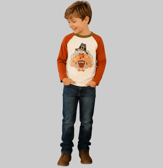 Boys Thanksgiving raglan shirt with turkey football appliqué and orange sleeves