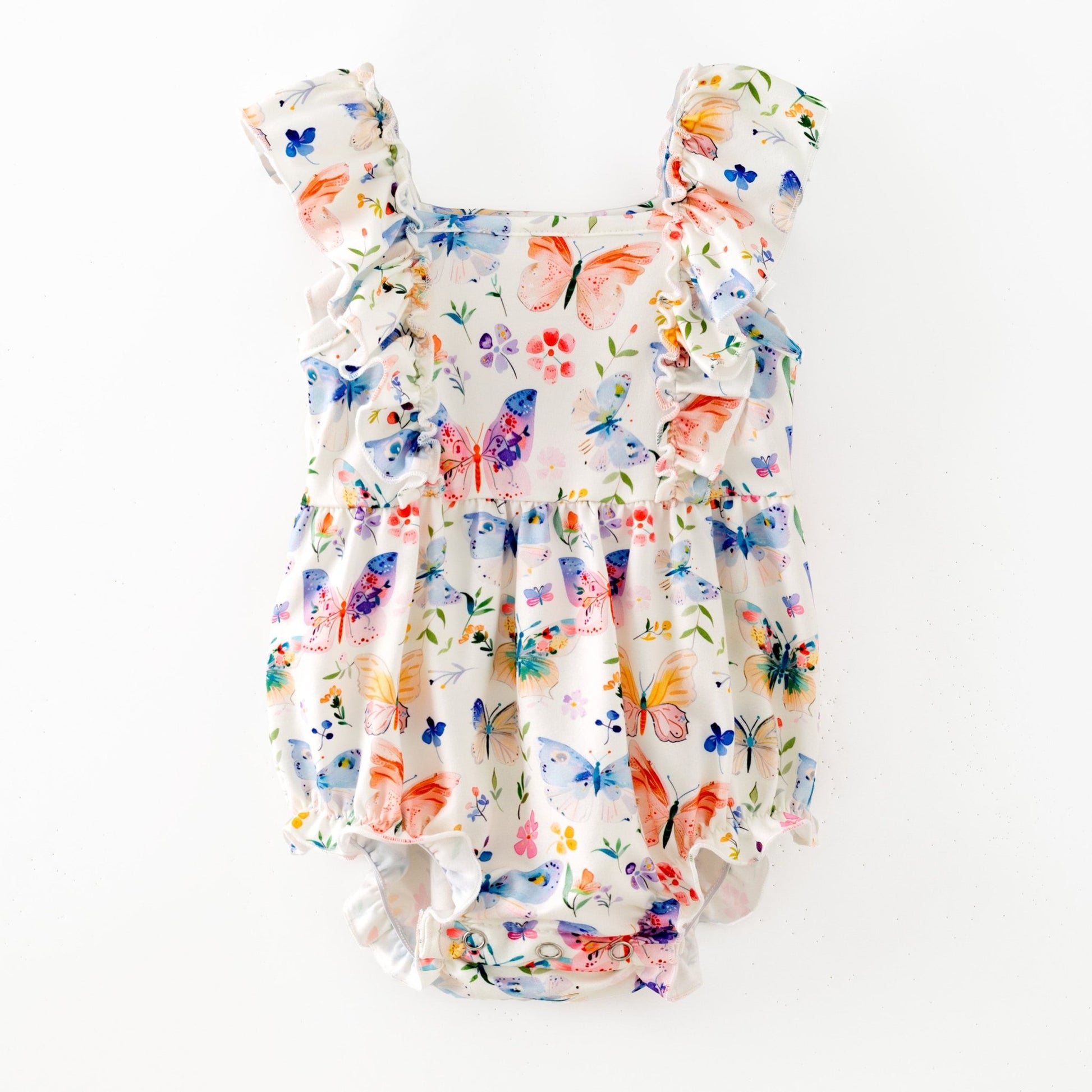 Floral baby romper with butterfly design on a white background