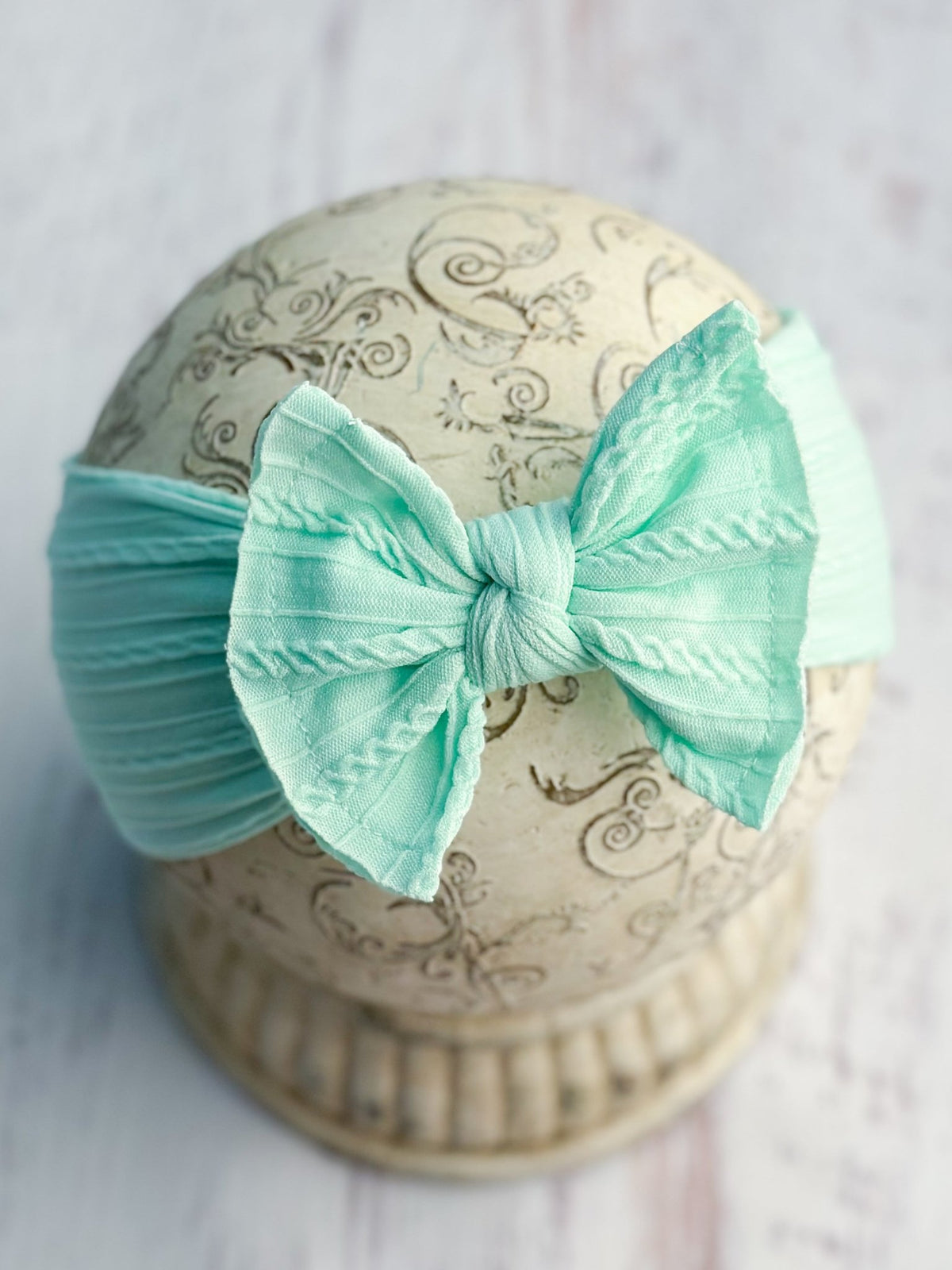 Aqua cable knit bow headband