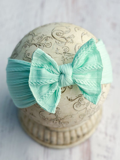 Aqua cable knit bow headband