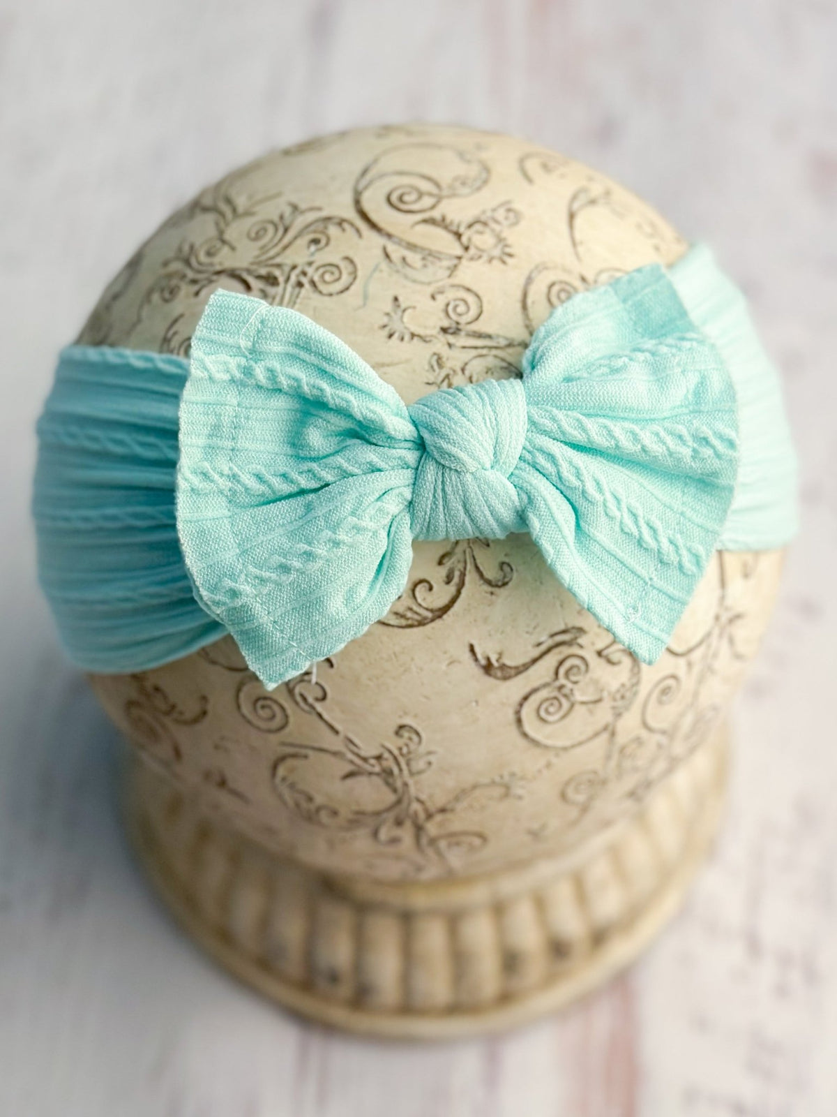 Light blue cable knit bow headband