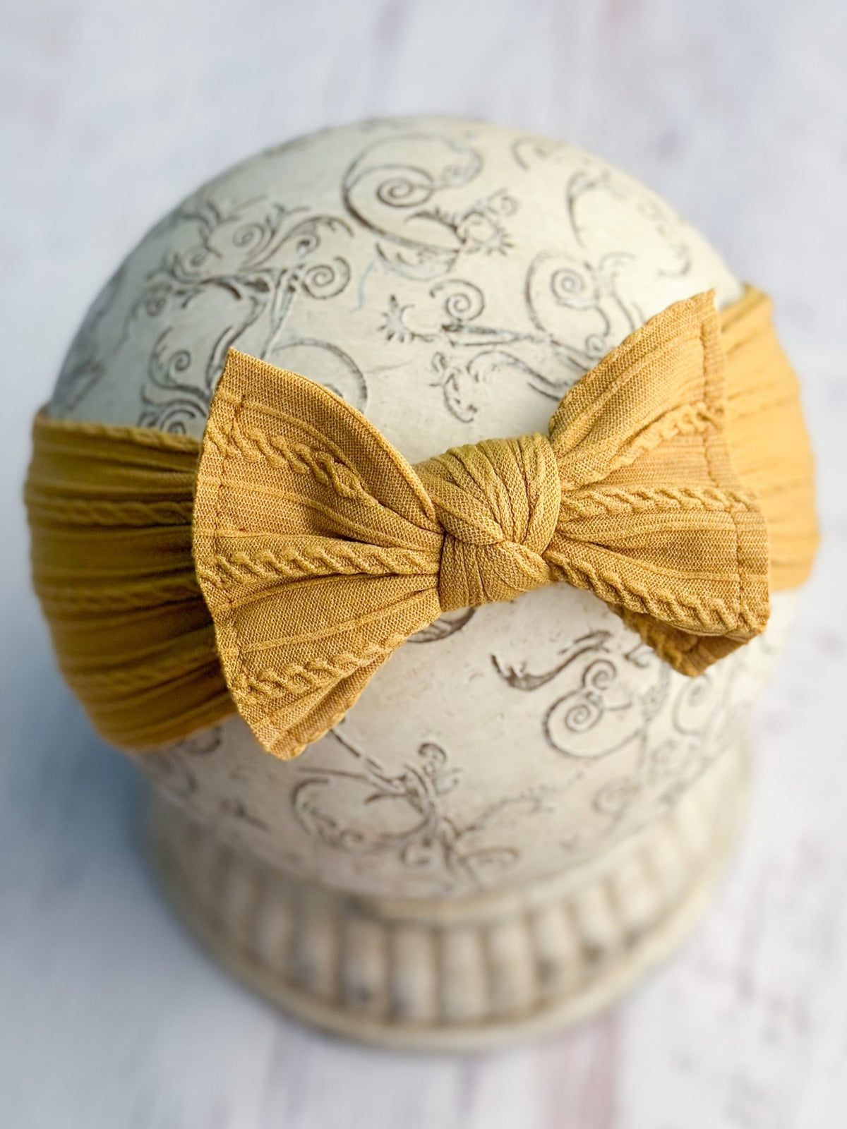 Mustard cable knit bow headband