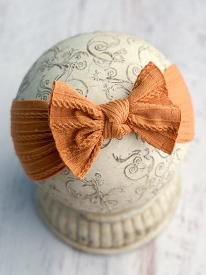 Pumpkin orange cable knit bow headband