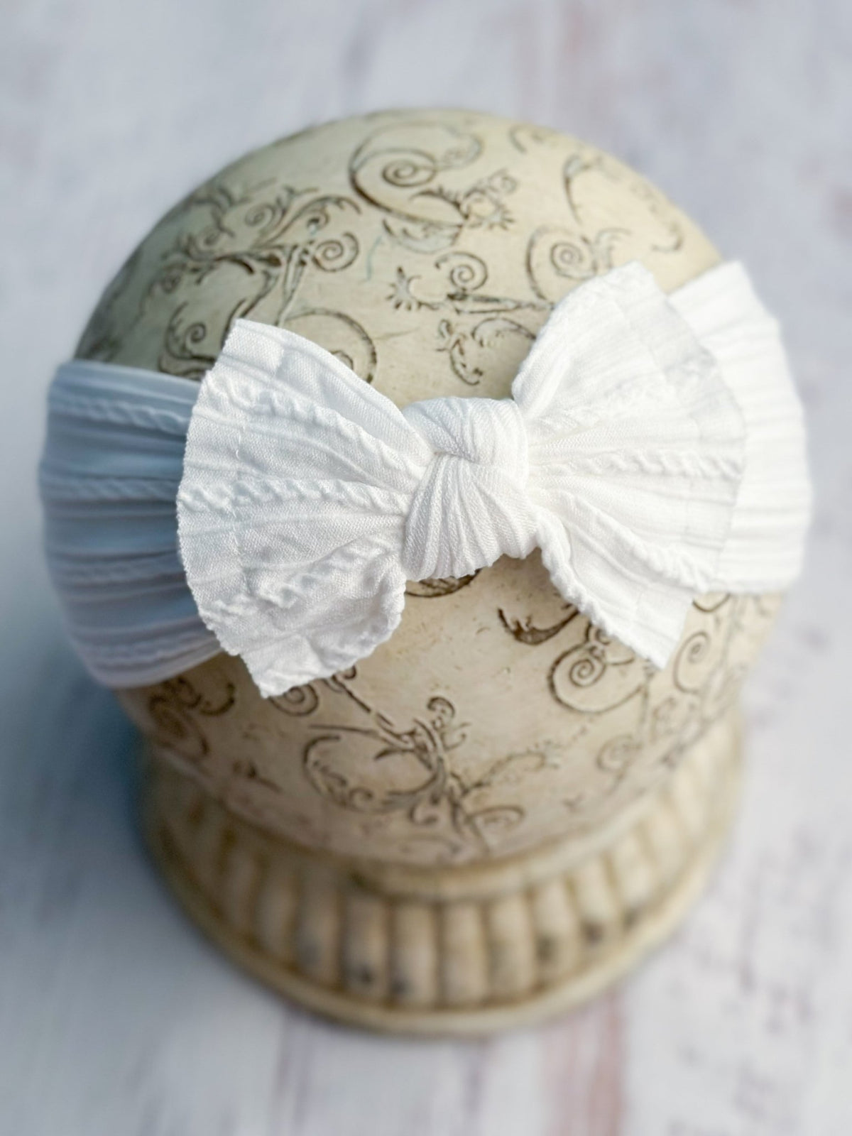 White cable knit bow headband