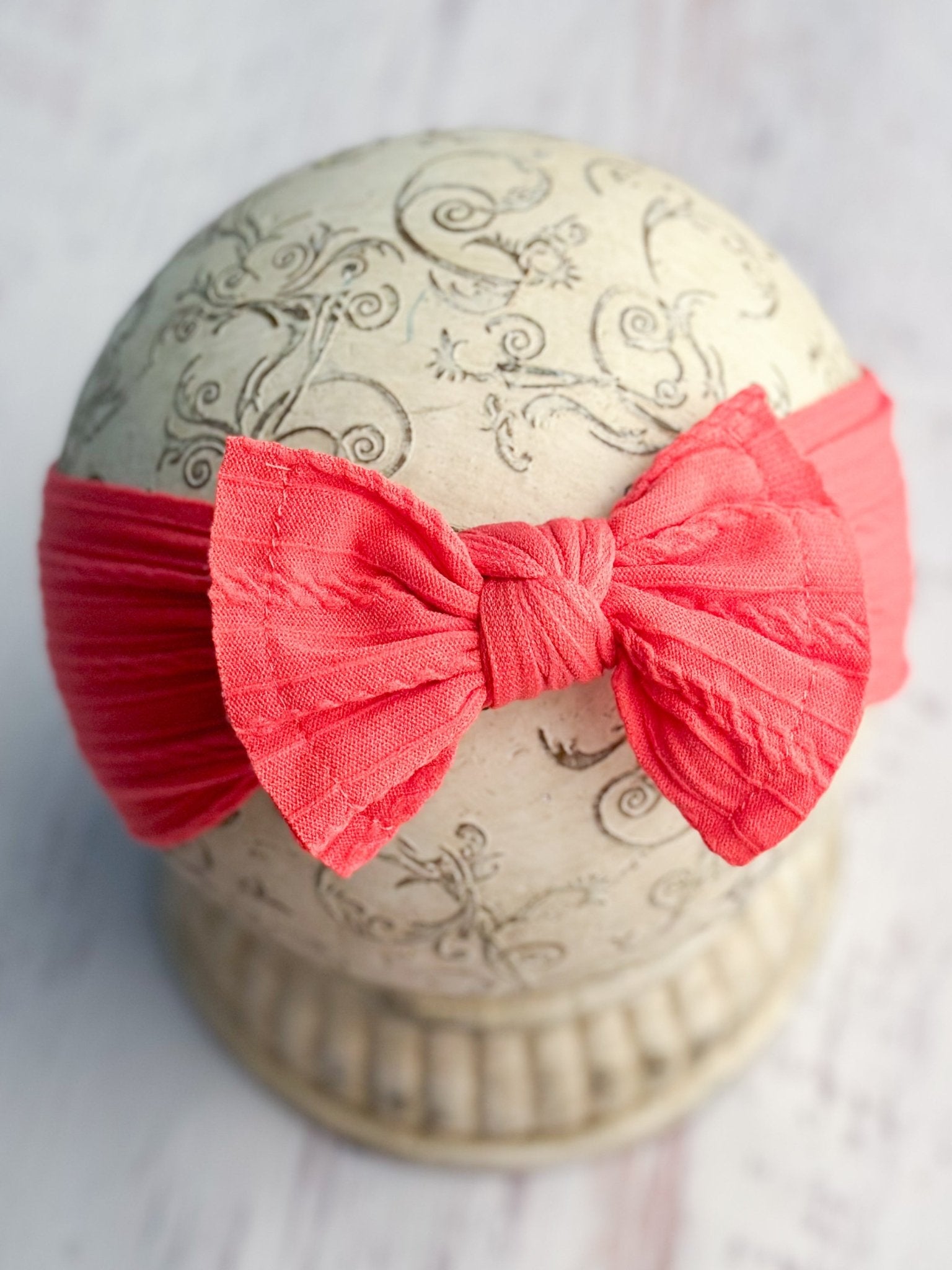 coral cable knit bow headband