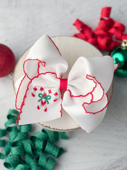 Candy cane embroidered hair bow on alligator clip