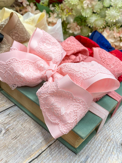 Chantilly lace bow up close detail headband for baby girls with soft nylon band
