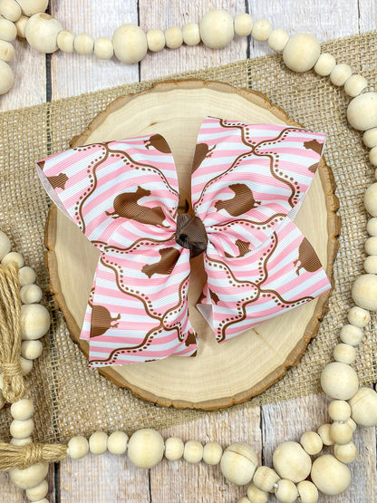 Chicken Coup Print Classic Hair Bow on a wooden surface