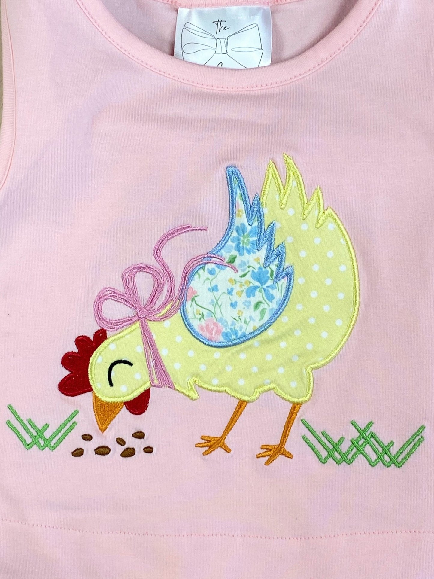 Close up detail photo of chicken embroidery