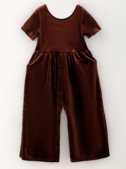 Chocolate brown girls’ velvet wide-leg jumpsuit with short sleeves and side pockets.