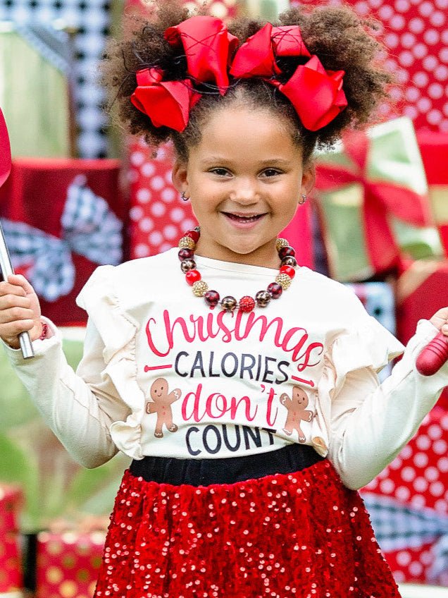 Christmas Calories Don't Count skirt set on a young female model.