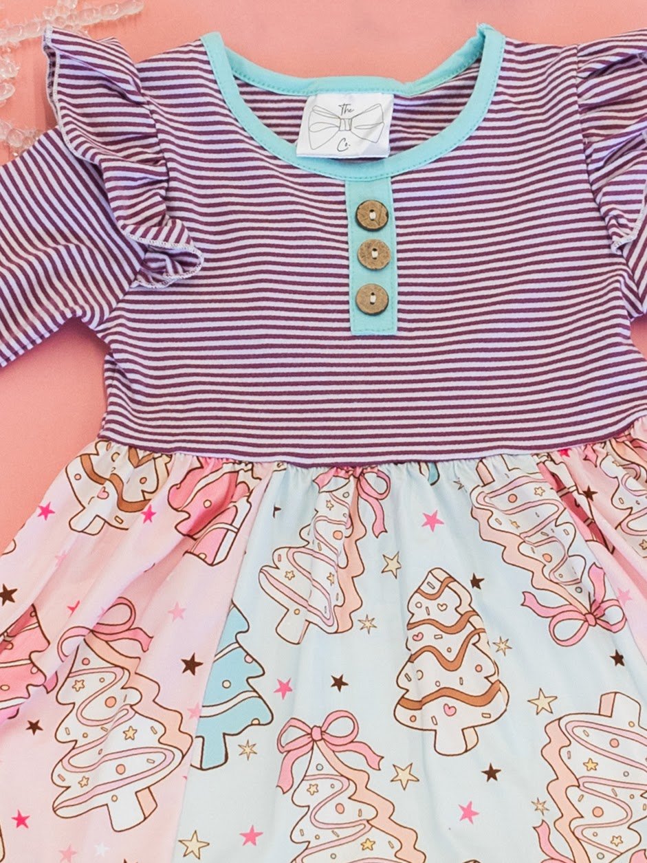 close up of the decorative buttons on front of the dress