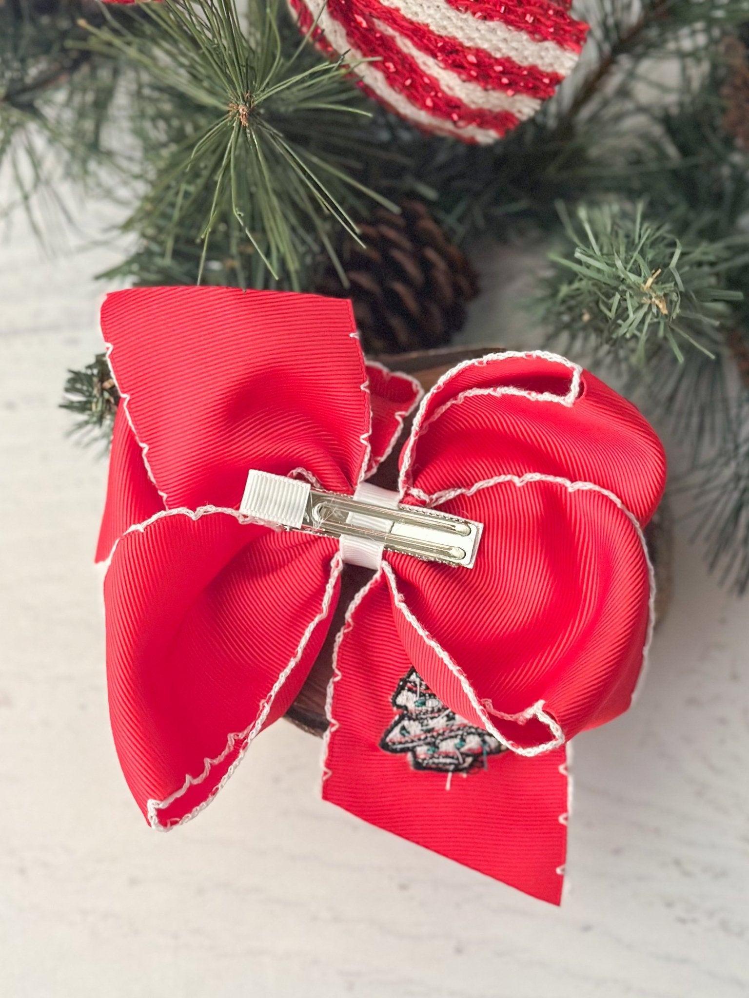 back of hair bow showing double prong clip