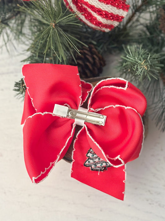Back of Christmas tree cake embroidered hair bow showing double prong alligator clip - Alternative view