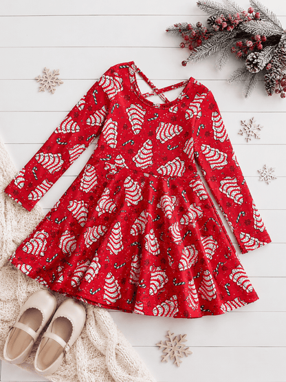 Christmas tree cake twirl dress on festive background