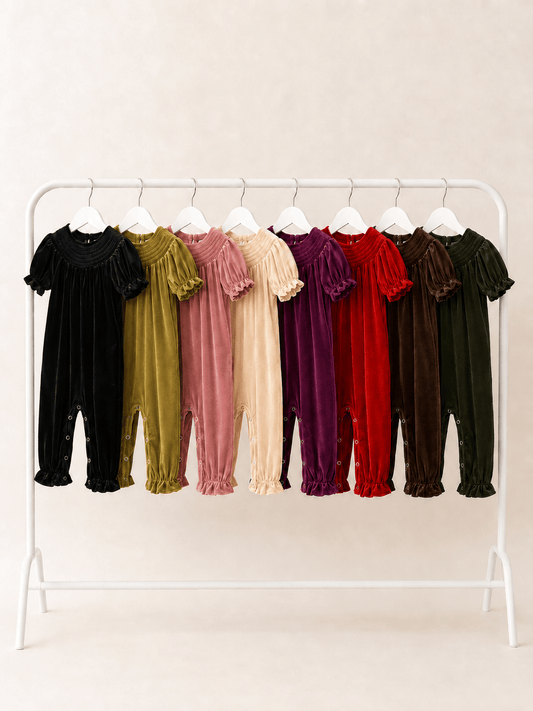 girls smocked velvet holiday rompers in 8 colors on clothing rack - Alternative view