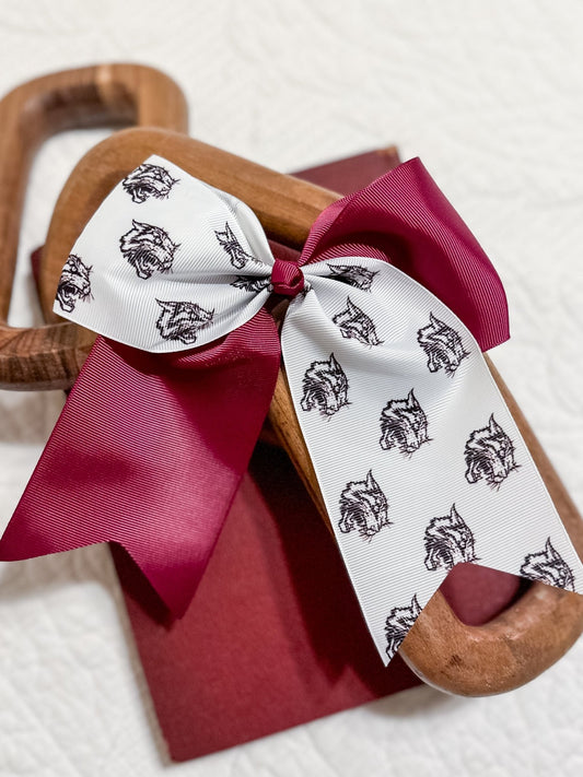 Clear Creek Wildcats cheer bow on a Pony-O hair tie