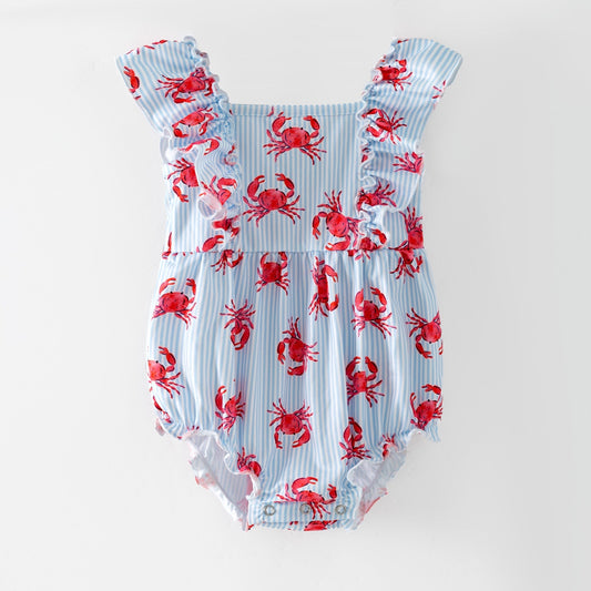Baby romper with red crab pattern on a white background