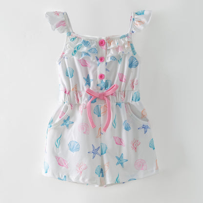 Children's romper with sea-themed print on a white background