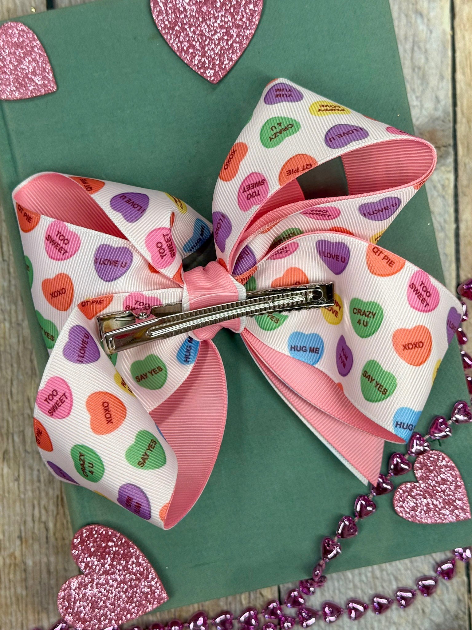 back of bow showing large alligator clip