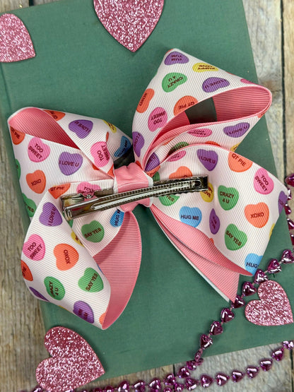 back of bow showing large alligator clip