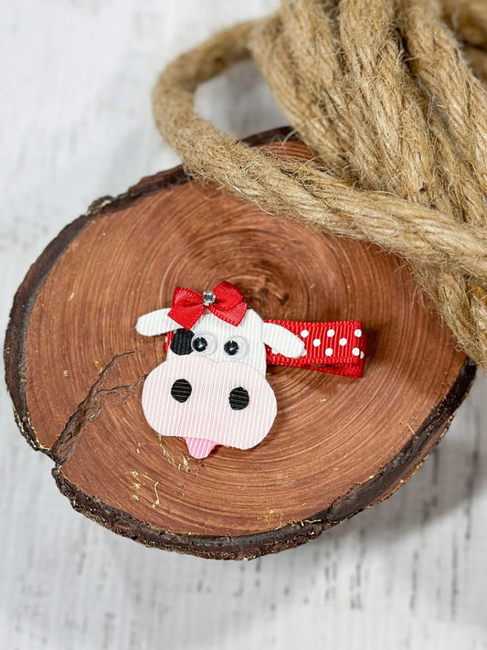 Black and white cow print ribbon clippie on alligator clip