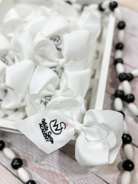 White custom embroidered school hair bow with brand label - Alternative view