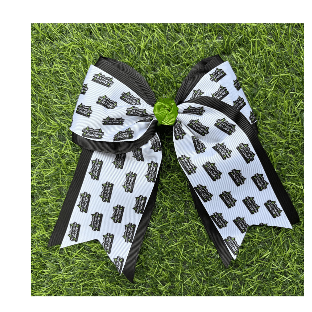 Black and white custom printed cheer bow on grass