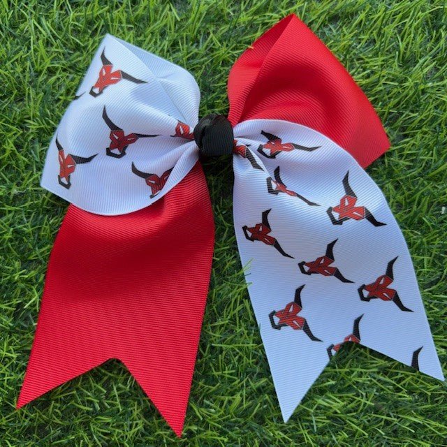 Red and white custom printed cheer bow on grass