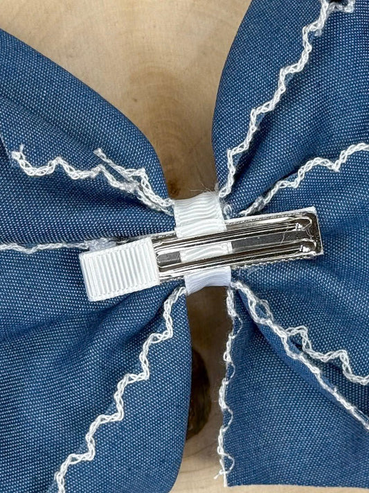 Back of denim moonstitch hair bow showing double prong alligator clip - Alternative view