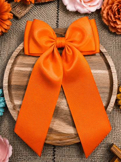 Orange double-looped long tail grosgrain hair bow