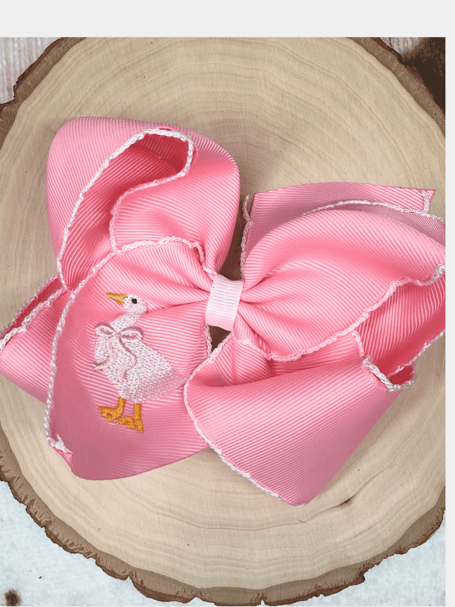 Pink moonstitch hair bow with embroidered white goose 