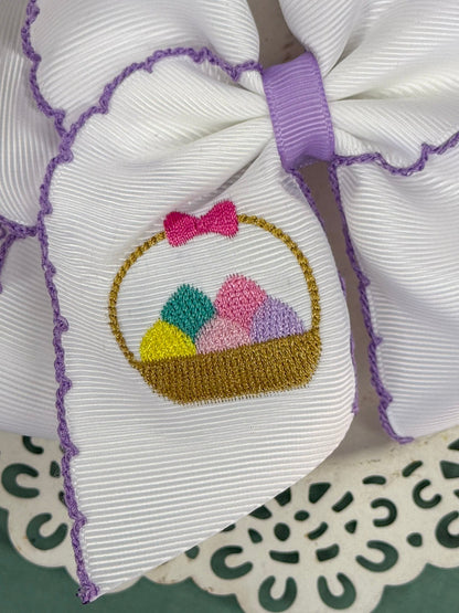 embroidered egg basket on white ribbon