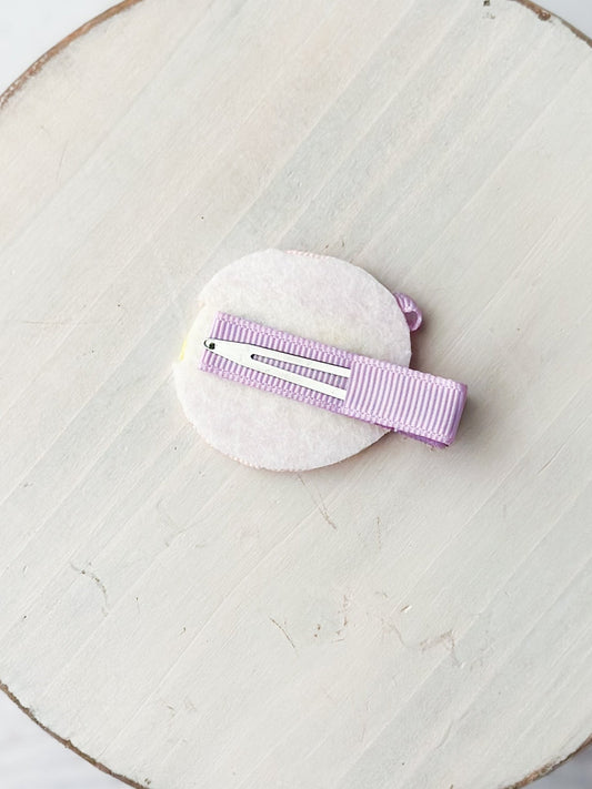 Back of bow with single prong alligator clip - Alternative view