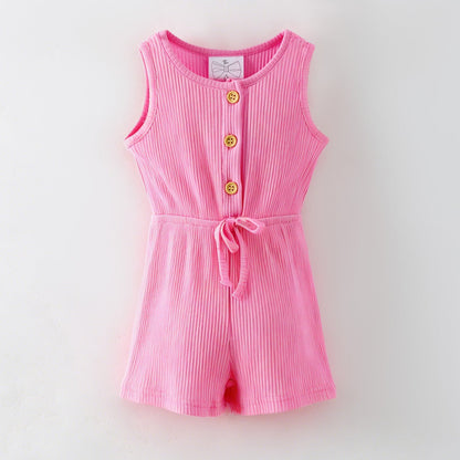 Pink romper with buttons on a light gray background